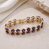 Goldenes Tennisarmband mit Amethyst