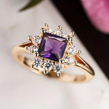Statement-Ring im Halo-Design mit Prinzessschliff